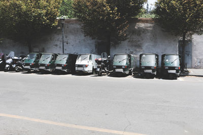 Cars parked on tree