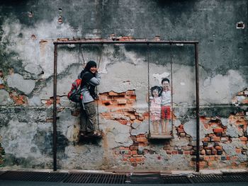 Graffiti on wall of old building