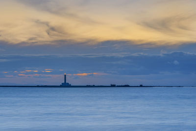View of sea against cloudy sky