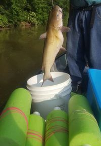 Low section of woman standing on tiled floor