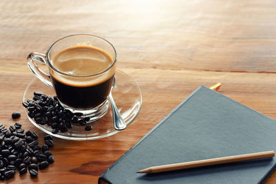 High angle view of coffee cup on table