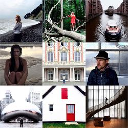 Portrait of young woman standing on wall
