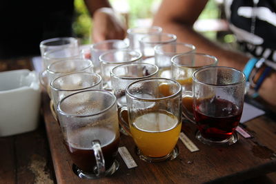 Close-up of coffee and tea glasses on table