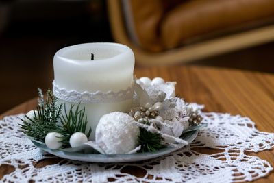 Candle decoration on the table during christmas