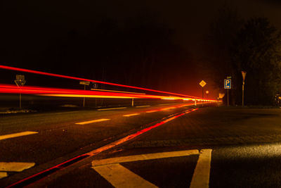 Light trails on road at night