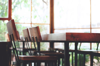 Empty chairs and table in restaurant
