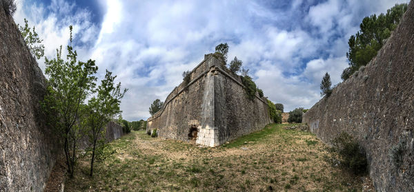 Panoramic view of old building against sky