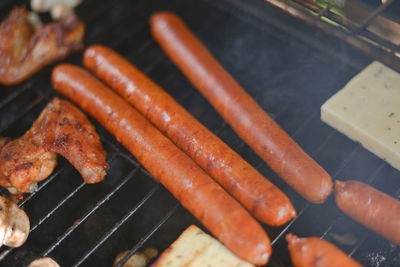 High angle view of food cooking on barbecue grill