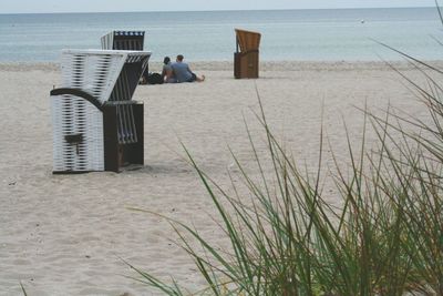 Couple sitting on beach