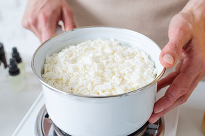 Midsection of man preparing food