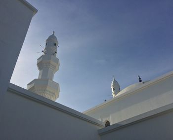 Low angle view of statue against sky