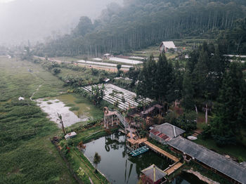 High angle view of river amidst buildings in city