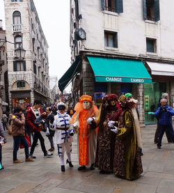 People standing on street in city