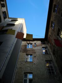 Low angle view of buildings against clear sky