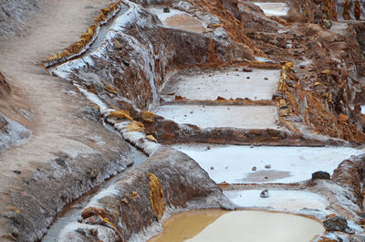 High angle view of salt terrace at maras