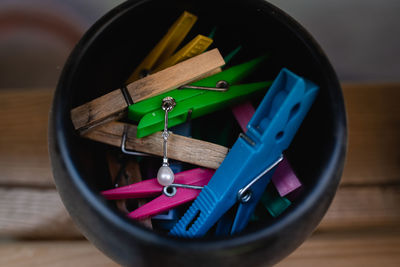 High angle view of blue container on table