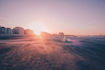 Scenic view of sea against clear sky during sunset