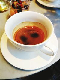 Close-up of coffee cup on table