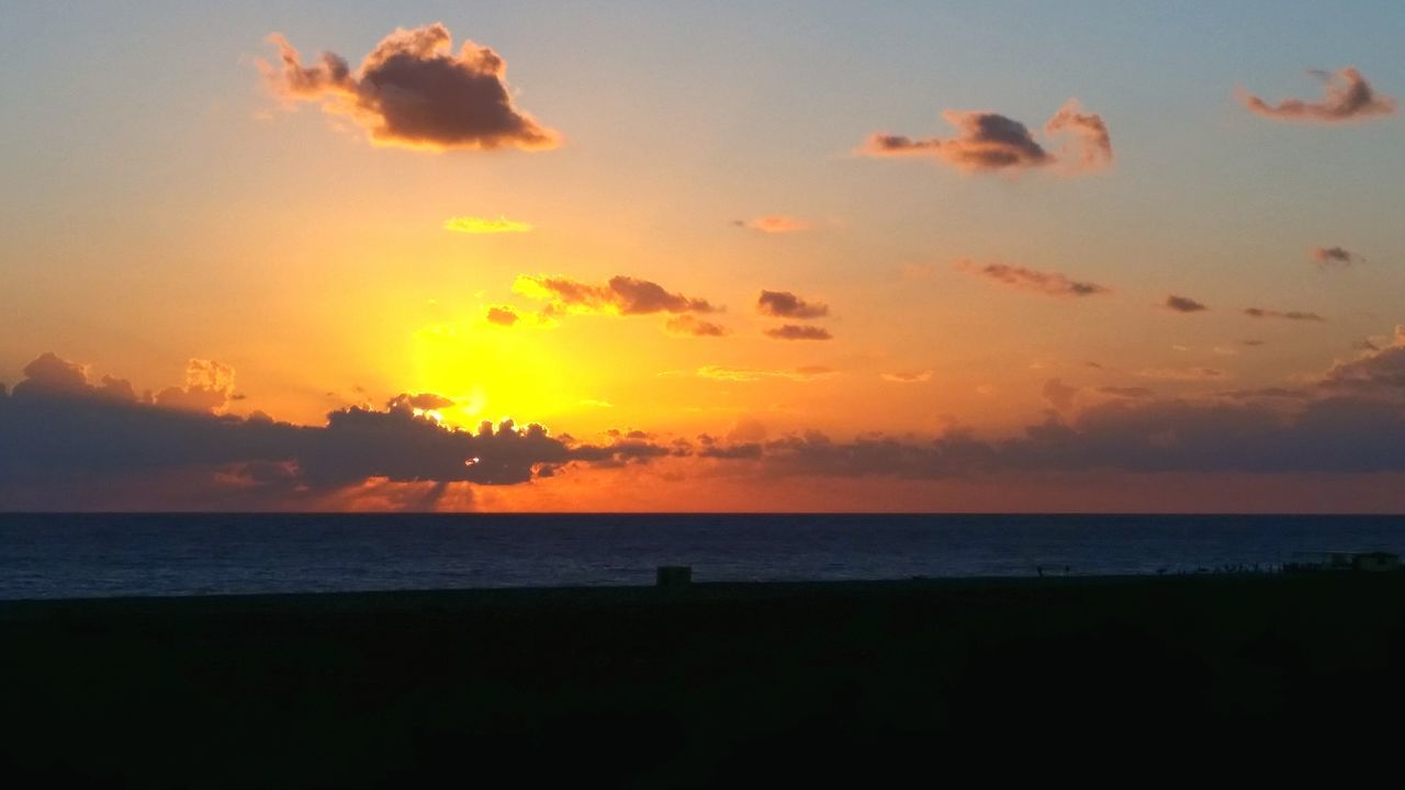 sunset, sea, horizon over water, water, scenics, tranquil scene, orange color, beauty in nature, tranquility, sky, silhouette, beach, idyllic, nature, sun, shore, cloud - sky, outdoors, remote, cloud