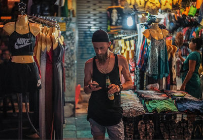 Man standing at market stall