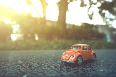 Close-up of toy car on street