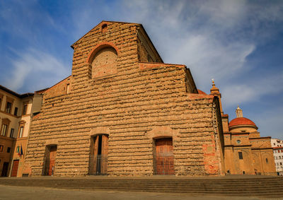 Low angle view of old building against sky