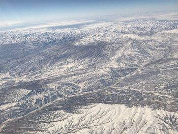 Aerial view of snow covered landscape