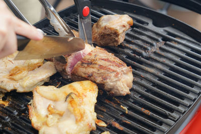 Close-up of meat on barbecue grill