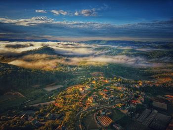 Aerial view of townscape against sky