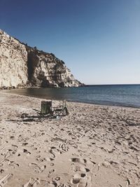 Scenic view of beach against clear sky