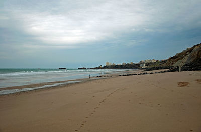 Scenic view of beach against sky