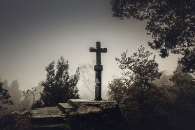 Cross against sky