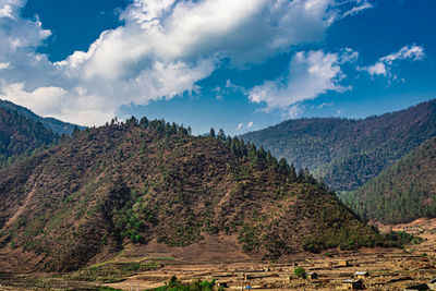 Mountain valley with bright blue sky at morning from flat angle