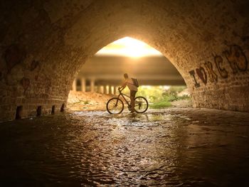 Woman in tunnel