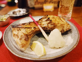 Close-up of food in plate on table