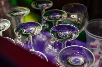 Low angle view of wineglasses on table