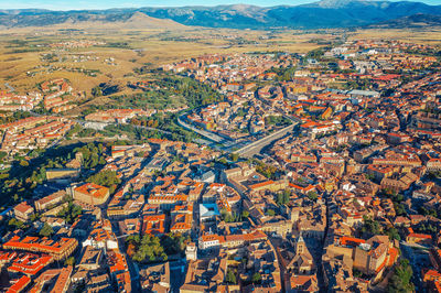 Bird-eye view of an ancient european town. ancient houses, temples. the city among the hills