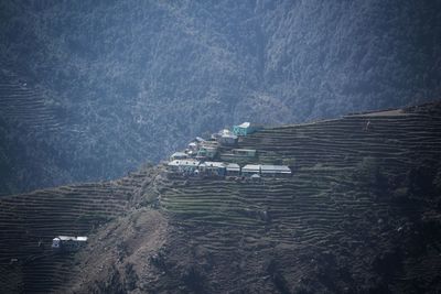 High angle view of plants on land against mountain