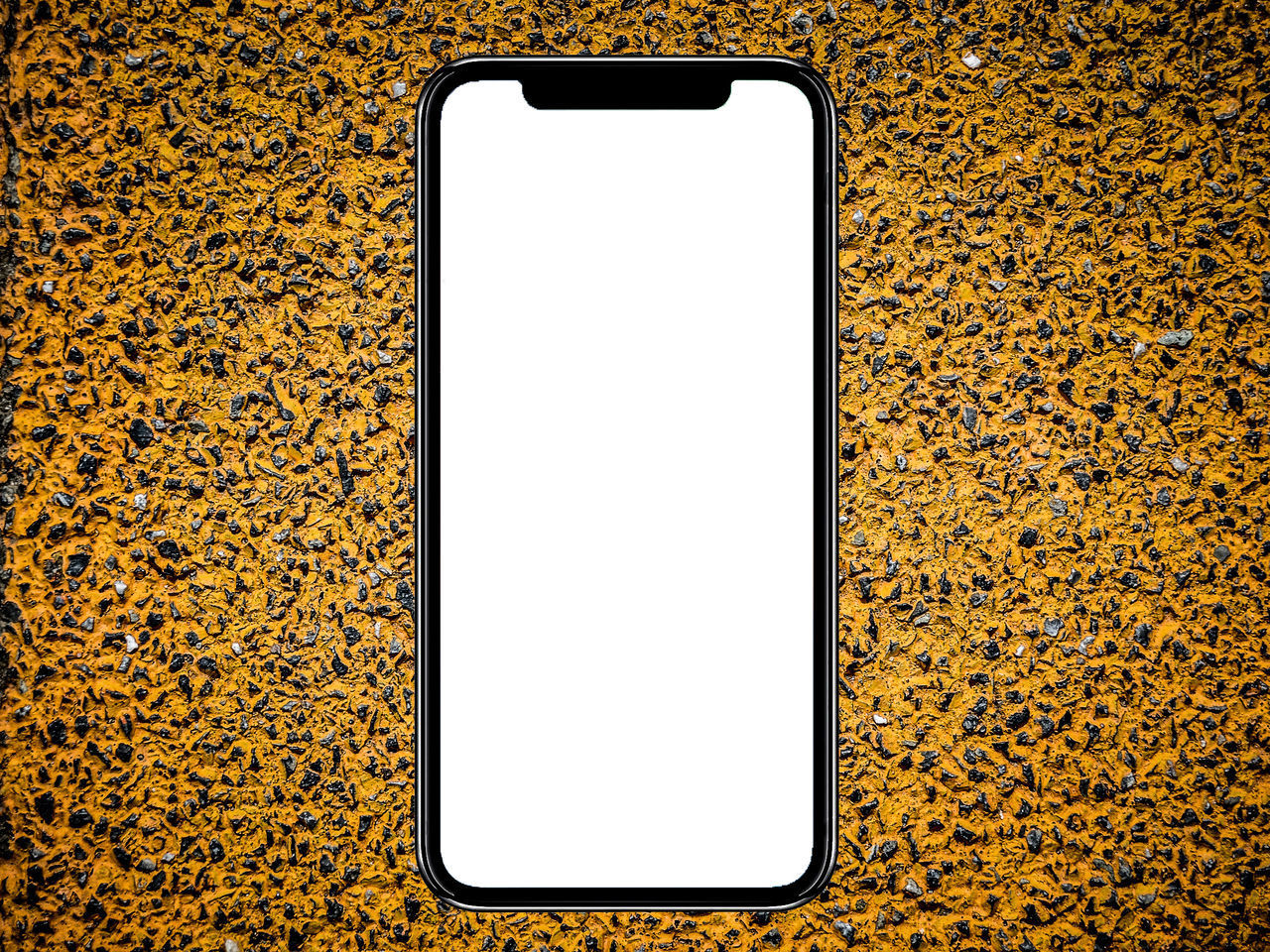 DIRECTLY ABOVE VIEW OF SMART PHONE ON YELLOW BACKGROUND