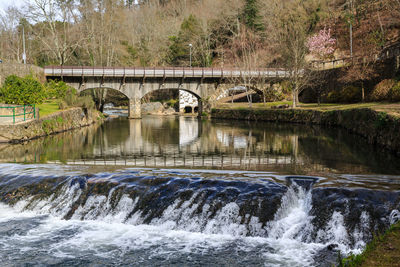 Bridge over waterfall