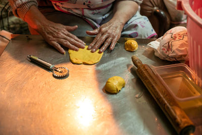 High angle view of woman preparing food