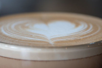 Close-up of coffee cup on table