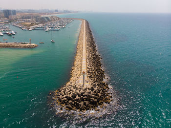 High angle view of groyne on sea