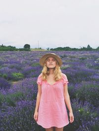 Woman standing on field
