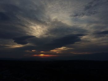 Scenic view of dramatic sky during sunset