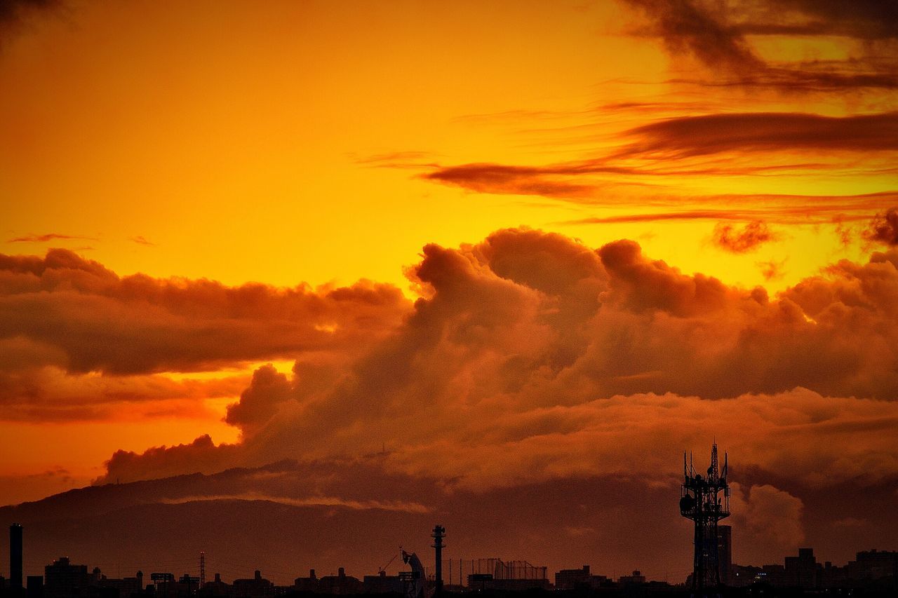 Low angle view of cloudy orange sky during sunset