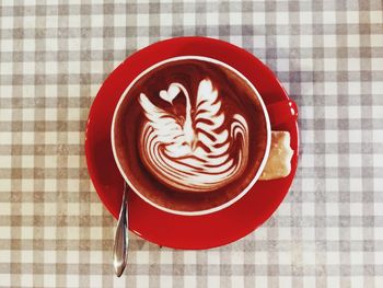 High angle view of cappuccino on table