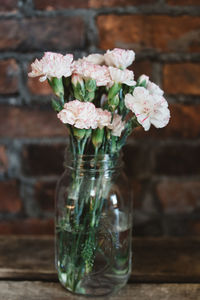 Close-up of flower vase on table