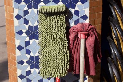 Close-up of umbrellas on floor at home