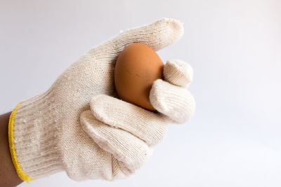 Close-up of stuffed toy against white background